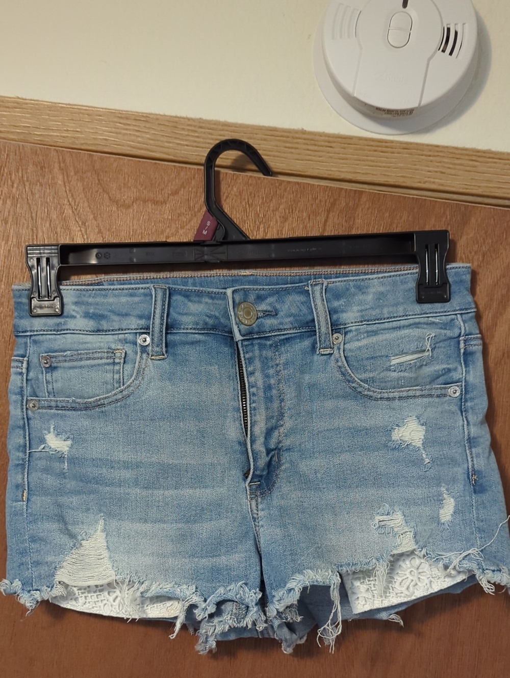 Frayed Light Blue Distressed Denim Shorts with Lace Trim